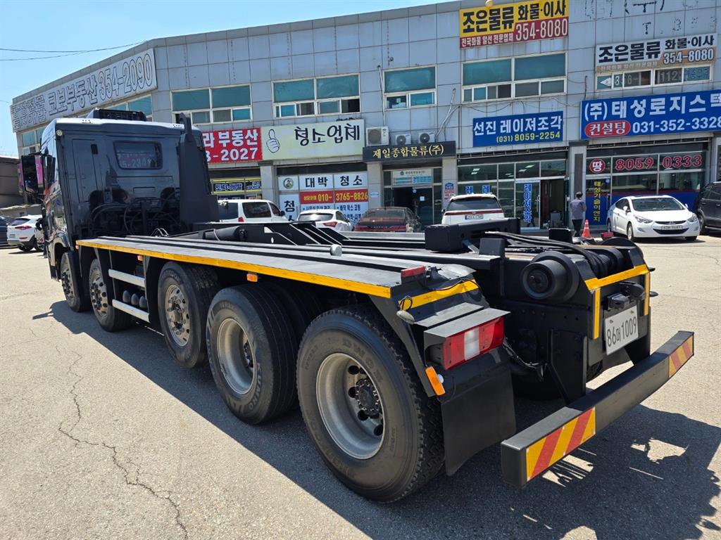엑시언트 암롤 540 23톤 오토 리타더 앞축