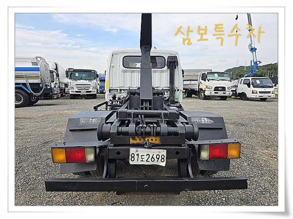 마이티 암롤 2.5톤 수동 단바리