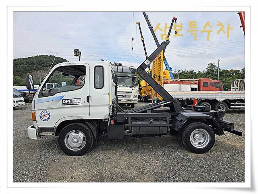 마이티 암롤 2.5톤 수동 단바리