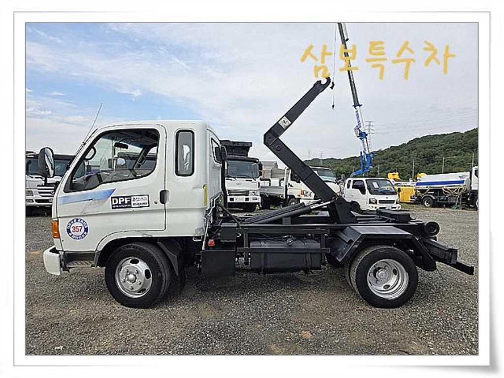 마이티 암롤 2.5톤 수동 단바리