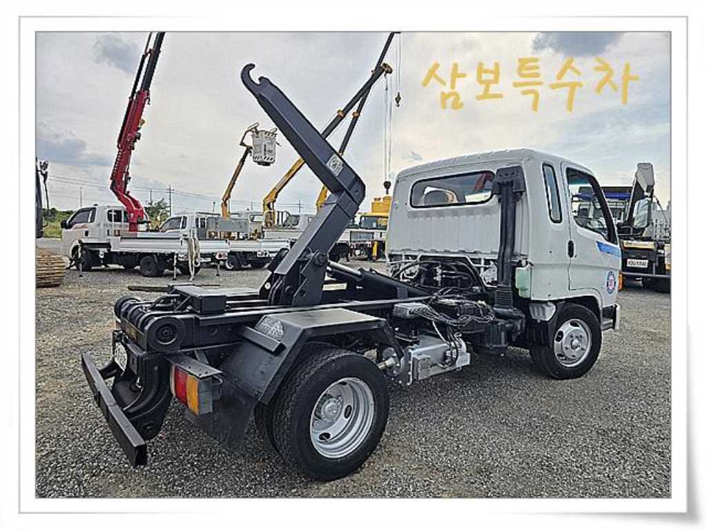 마이티 암롤 2.5톤 수동 단바리