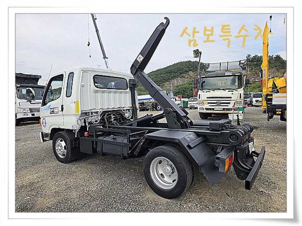 마이티 암롤 2.5톤 수동 단바리