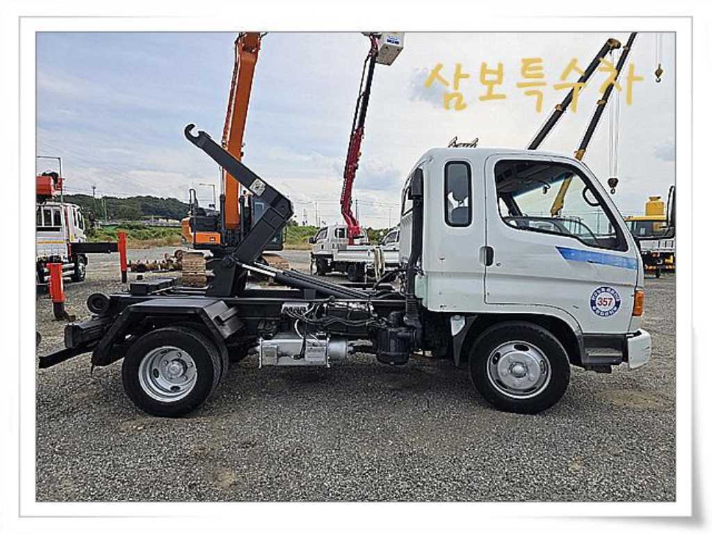 마이티 암롤 2.5톤 수동 단바리