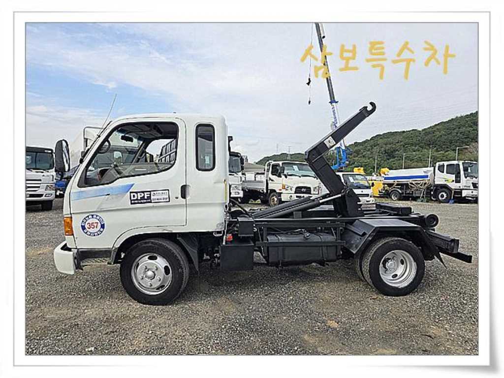 마이티 암롤 2.5톤 수동 단바리