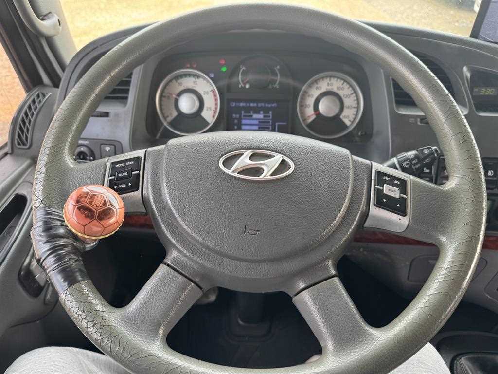 현대 트라고 암롤 25톤 수동 8