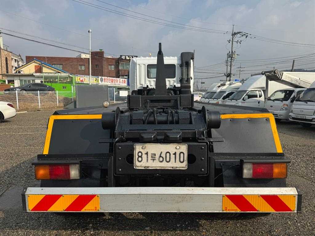 현대 트라고 암롤 25톤 수동 4