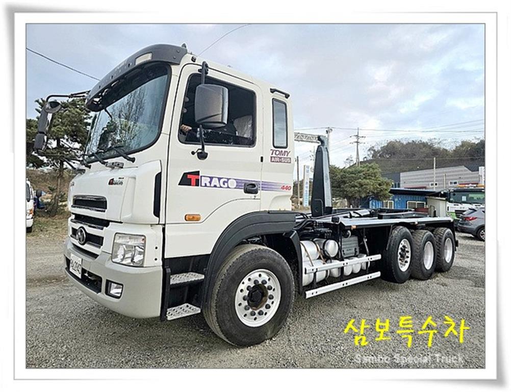 현대 트라고 암롤 24톤 수동
