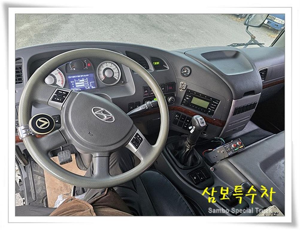 현대 트라고 암롤 24톤 수동 11