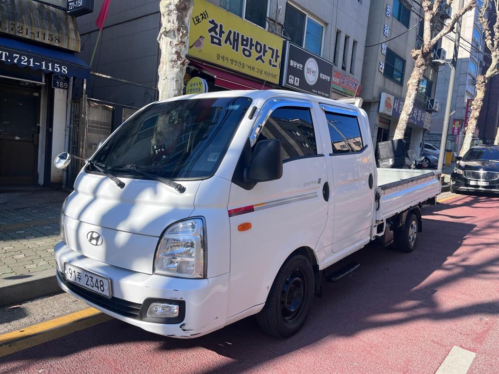 현대 포터2 1톤 카고 더블캡 장축 - 중고 트럭 매물 이미지