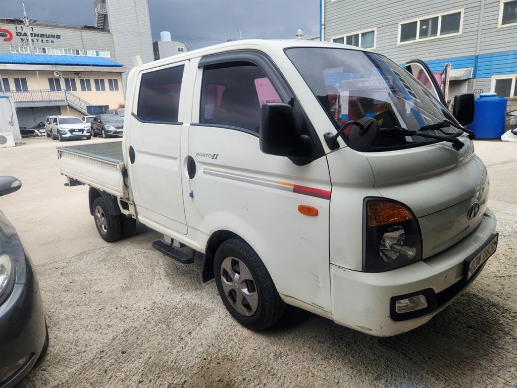 현대 포터2 1톤 카고 더블캡 장축 - 중고 트럭 매물 이미지